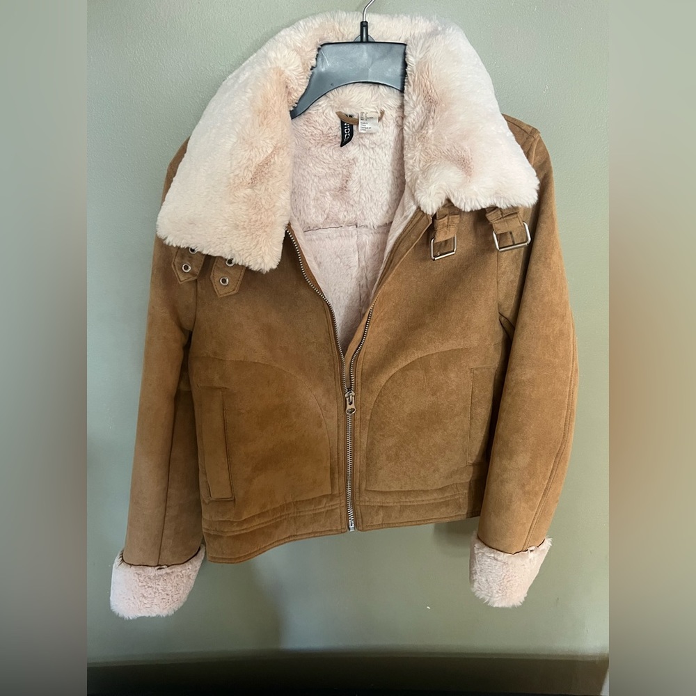 Divided brown suede jacket